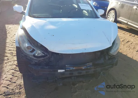 2016 Hyundai Elantra Limited z USA, uszkodzony, nr VIN 5NPDH4AE3GH659036